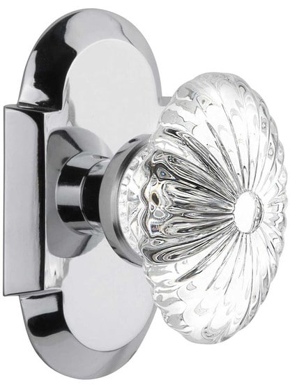 Arched Rosette Door Set with Oval Fluted-Crystal Glass Knobs in Polished Chrome.